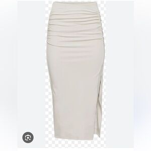 Aritzia babaton meta skirt cream color